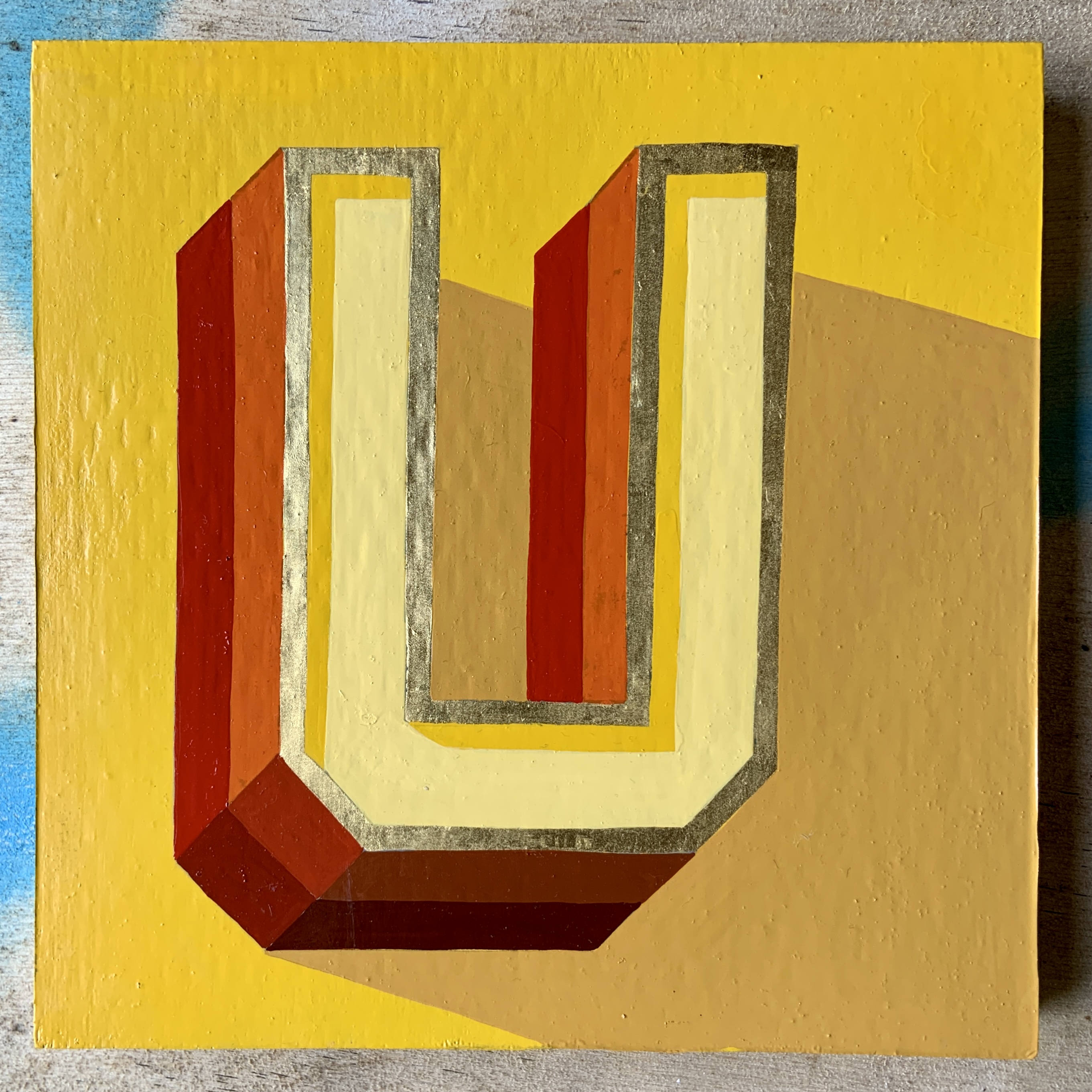 Letter U hand painted and gilded