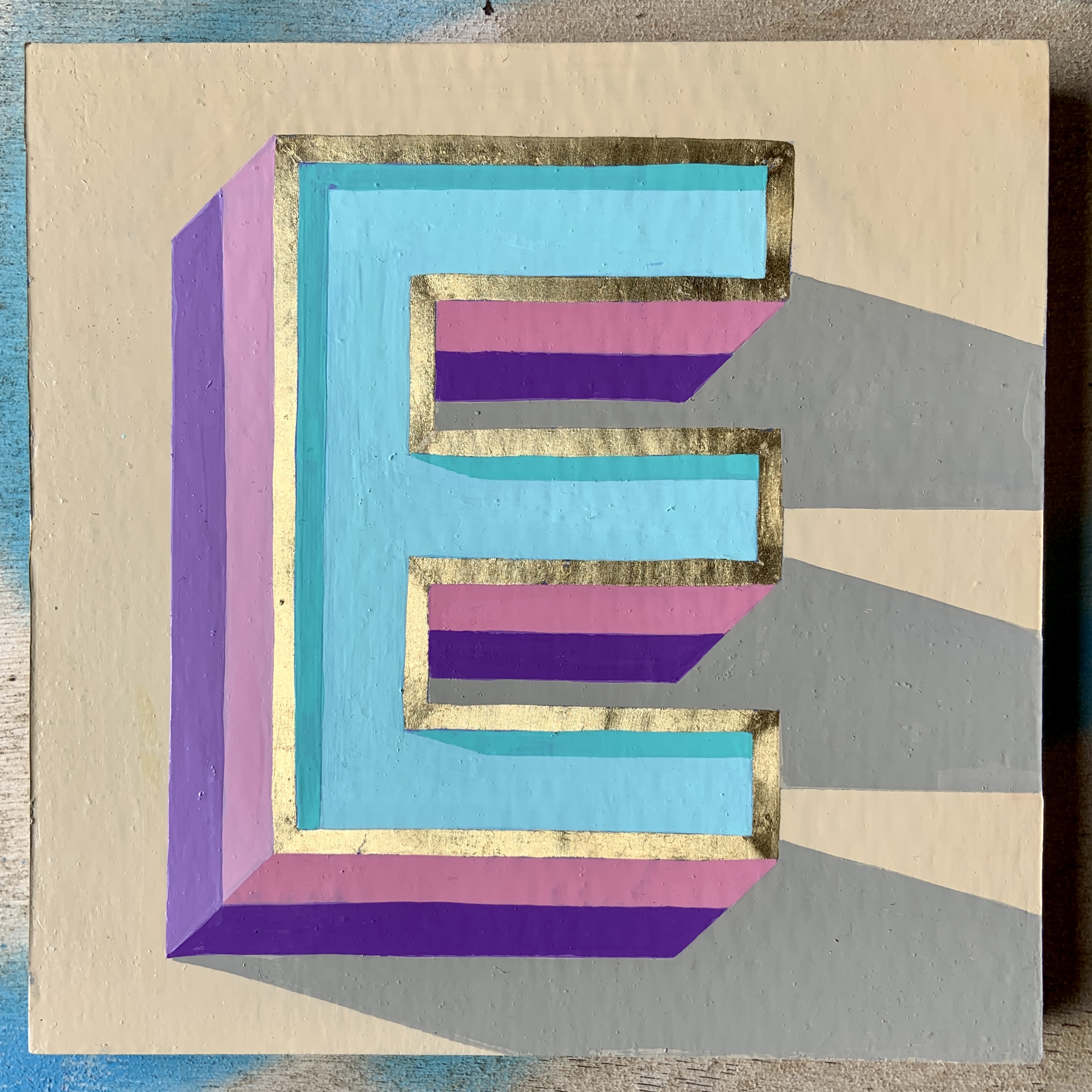 Letter E hand painted and gilded