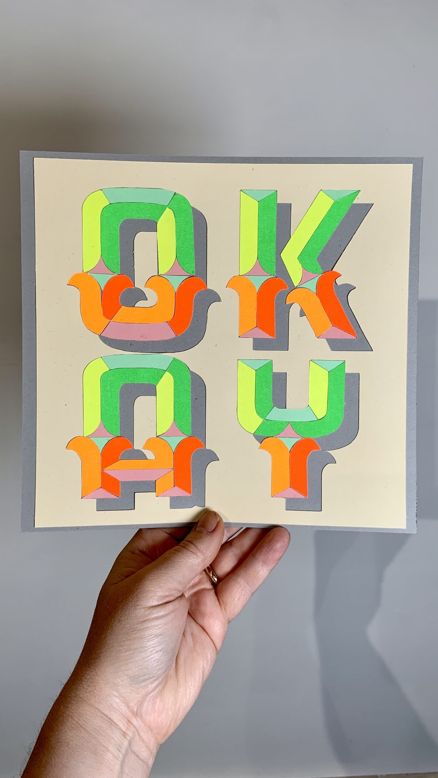 OKAY unique hand drawn design, hand-finished PAPER CUT art in neon and pastel card