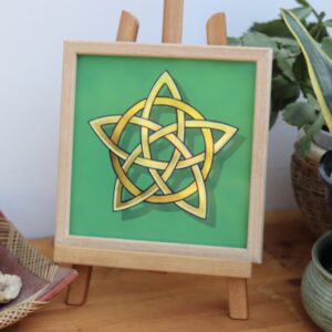 Stunning gold leaf mirror effect 5 pointed celtic knot star in 2 colours of genuine gold leaf on a green background and framed in oak wood