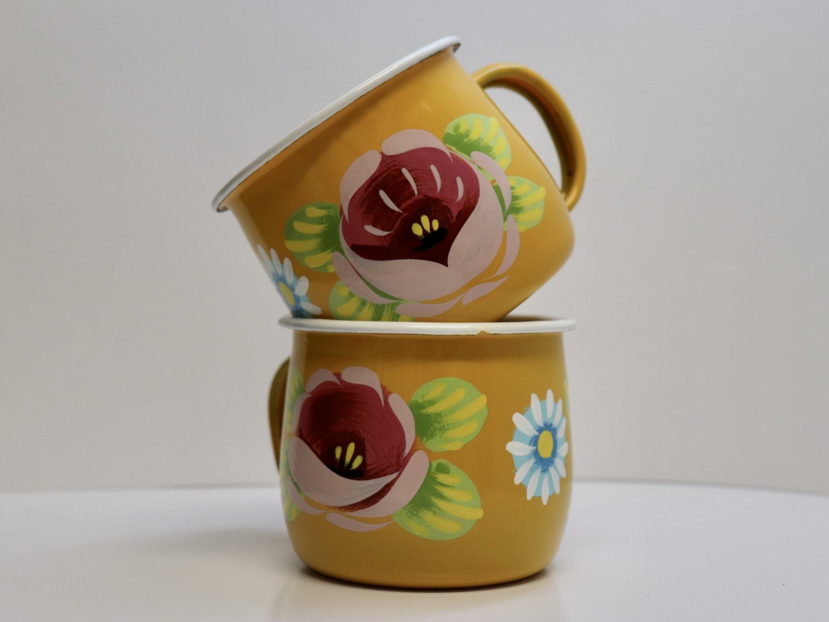 Canal Roses handpainted yellow enamel mugs with pink roses & daisies