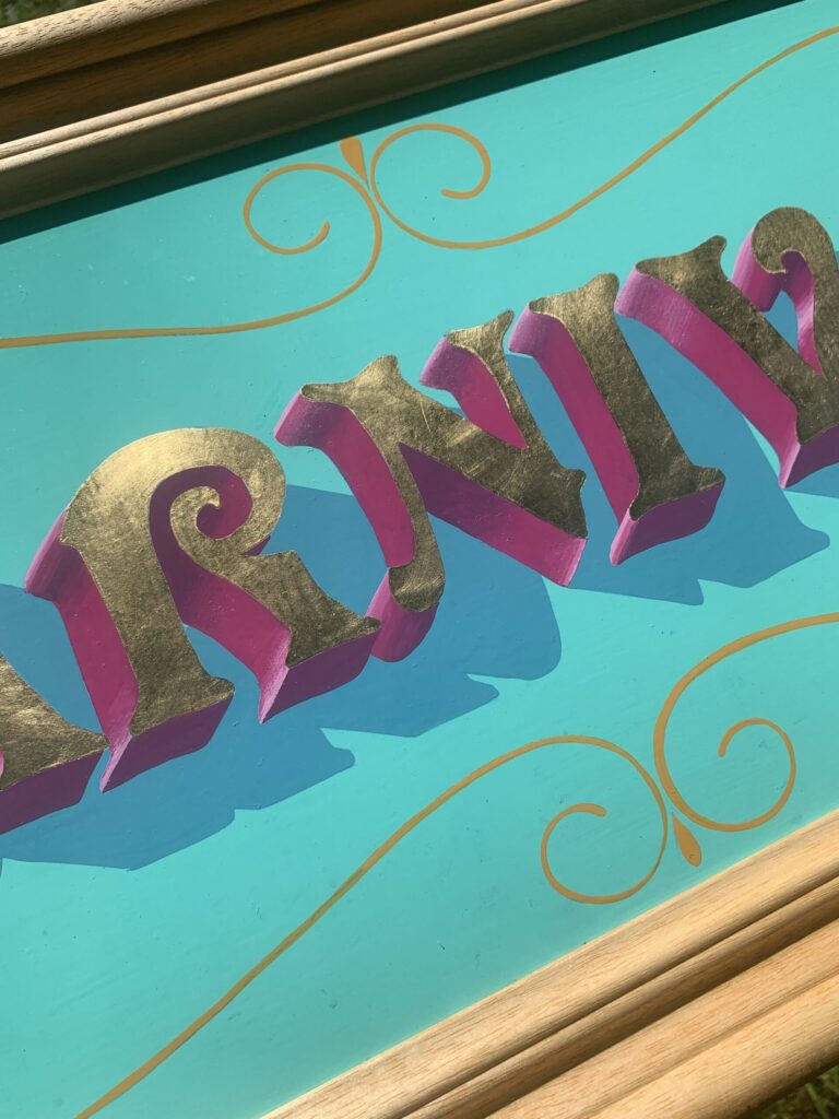 Detail ofCARNIVAL hand-painted and gilded letter art sign