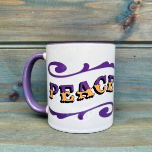 White & purple ceramic mug with Circus Style hand-lettered ‘PEACE’ design