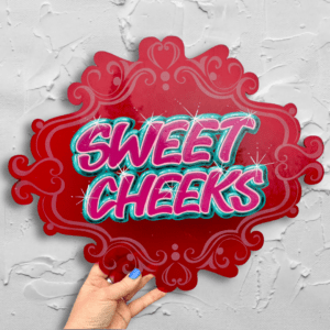 'Sweet Cheeks' cute handpainted lettering in magenta and teal onto a red acrylic curvy shaped panel