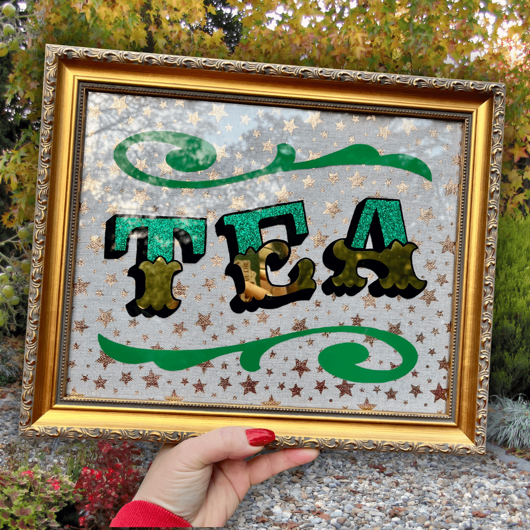 ‘TEA’ Glass Gold leaf Circus Style Lettering Artwork with Glitter and Decorative Scrolls