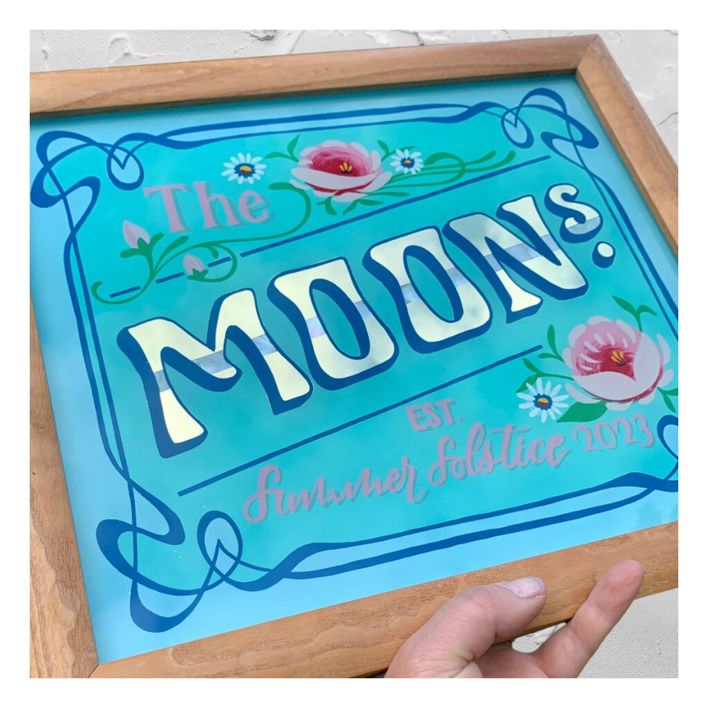 white Gold & Gold leaf blend wedding sign MOONS with pink roses on blue background